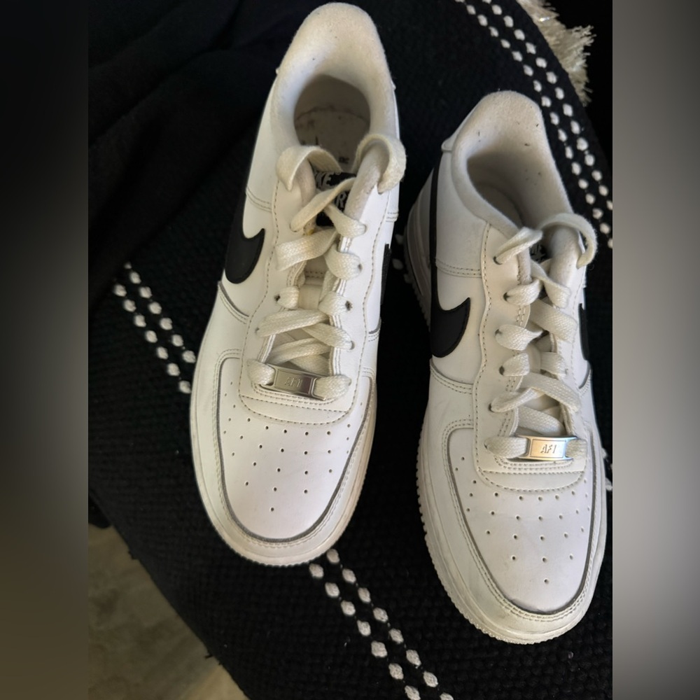 Nike Air Force ones withh black swoosh